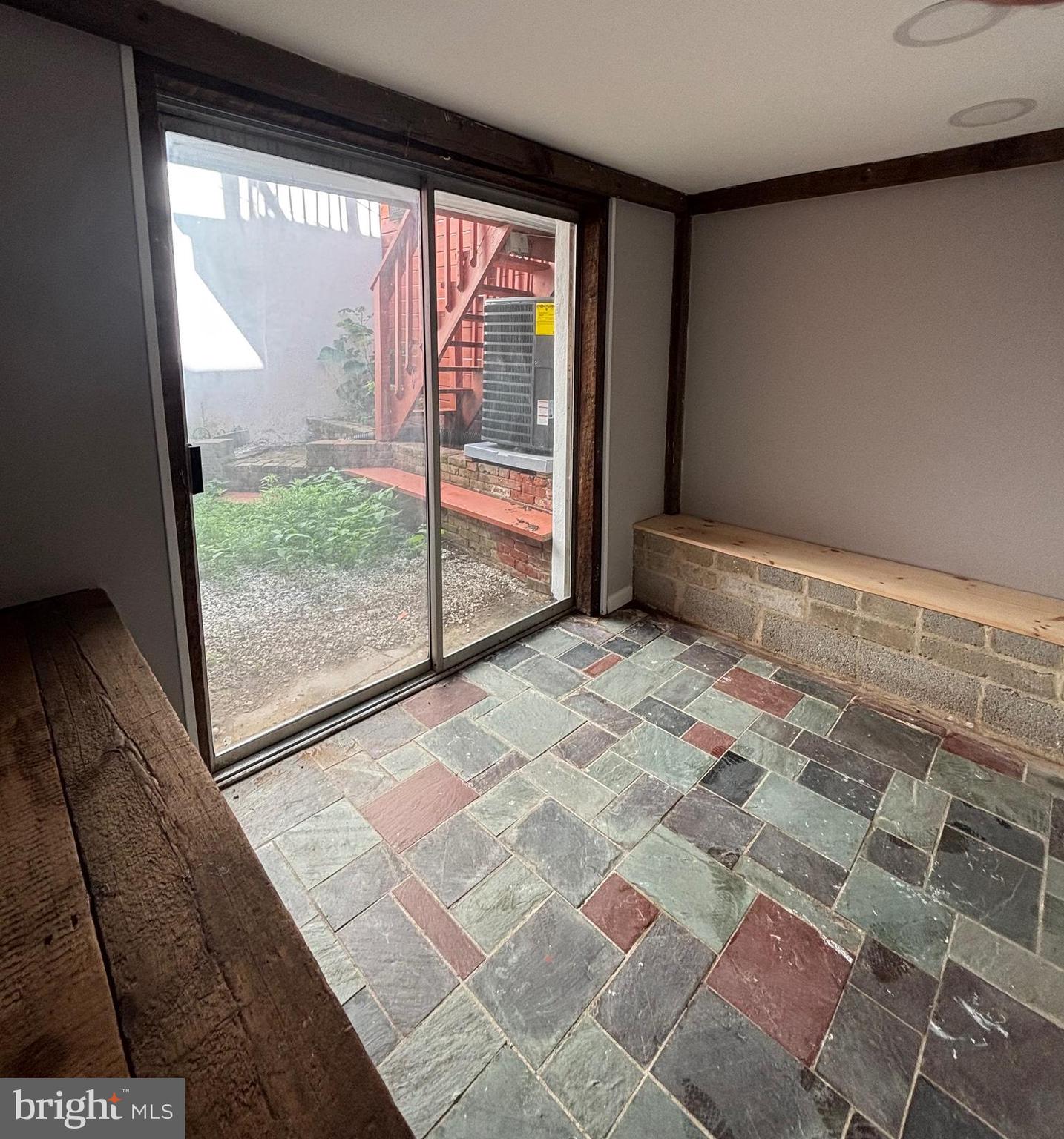 903 Lovering Avenue Wilmington, DE 19806 - Photo 15 of 16 a view of a room with a large window