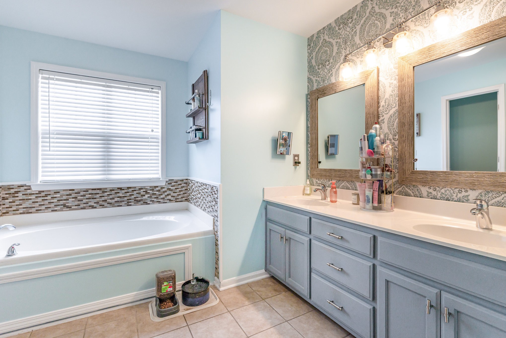 2261 Dewey Drive Spring Hill, TN 37174 - Photo 15 of 26 a bathroom with a tub a sink and a window