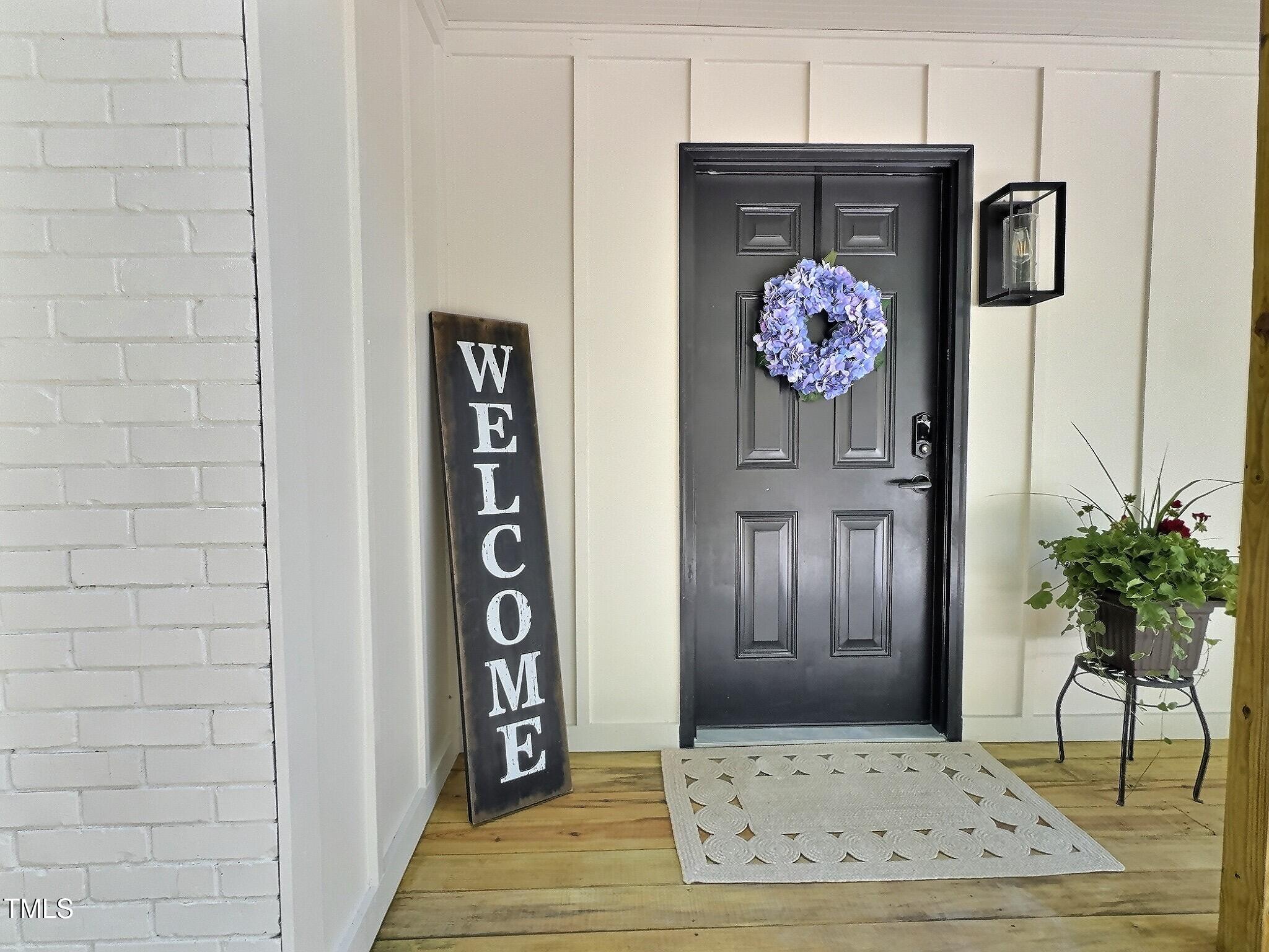 116 Lumpkin Street Raleigh, NC 27610 - Photo 2 of 20 a view of a hallway with elevator