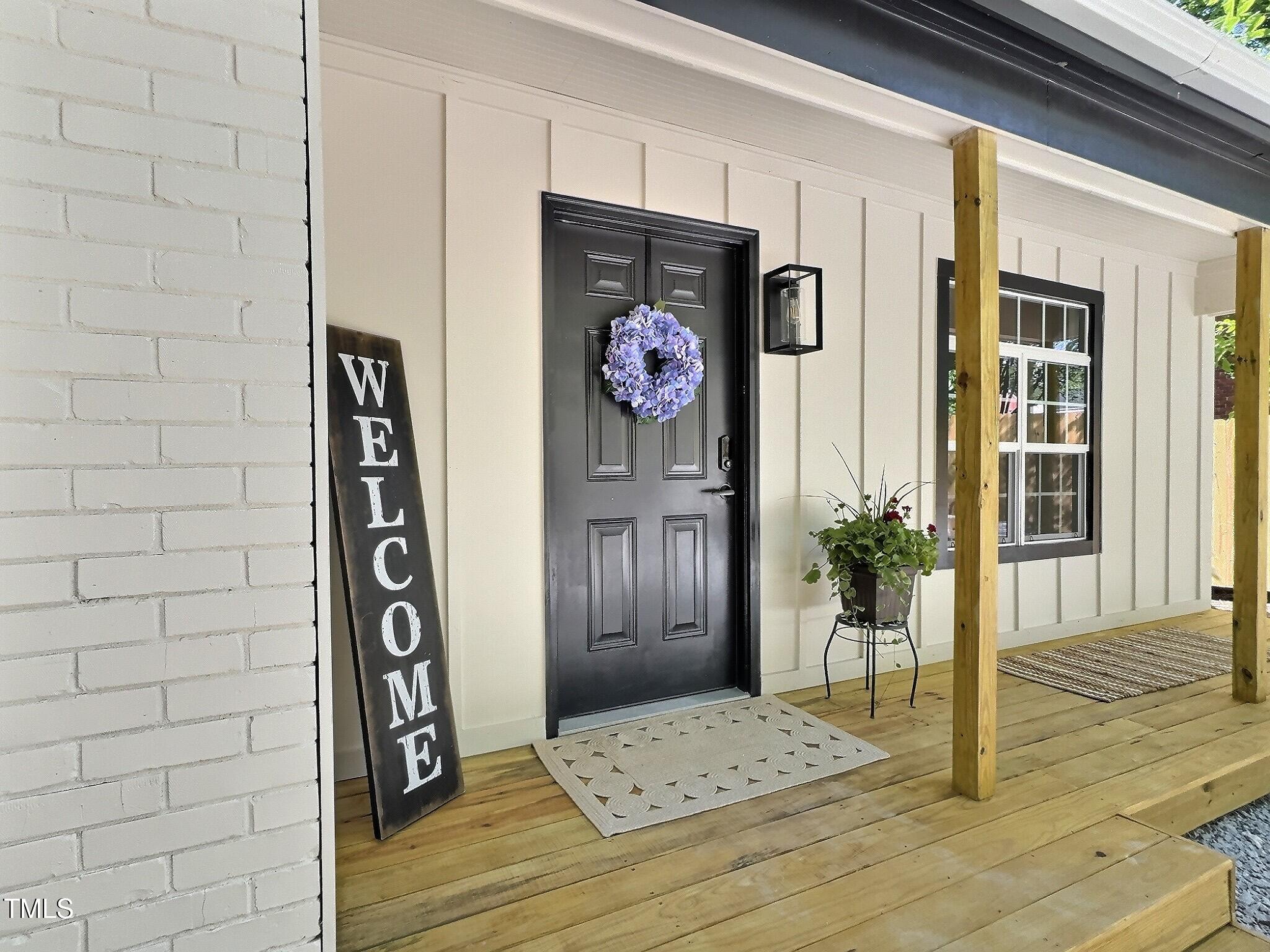 116 Lumpkin Street Raleigh, NC 27610 - Photo 3 of 20 a view of entryway front of house
