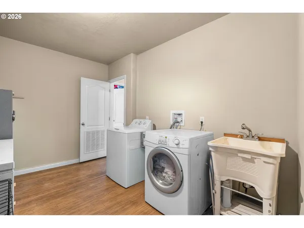 a utility room with dryer and washer