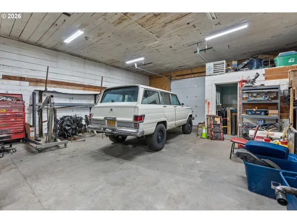 a garage with a car and car