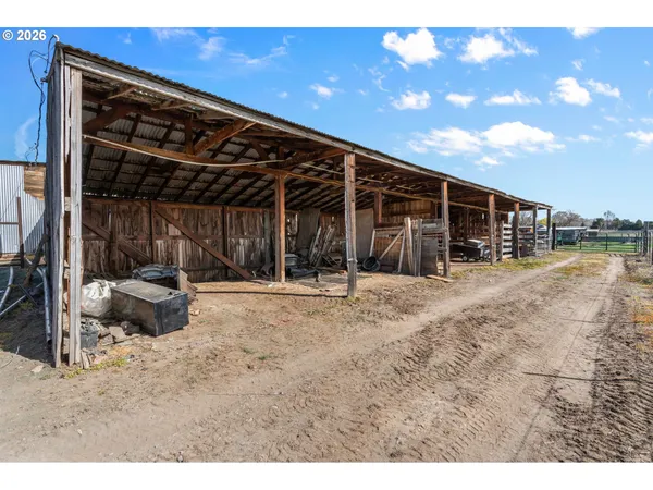 a view of a backyard of the house