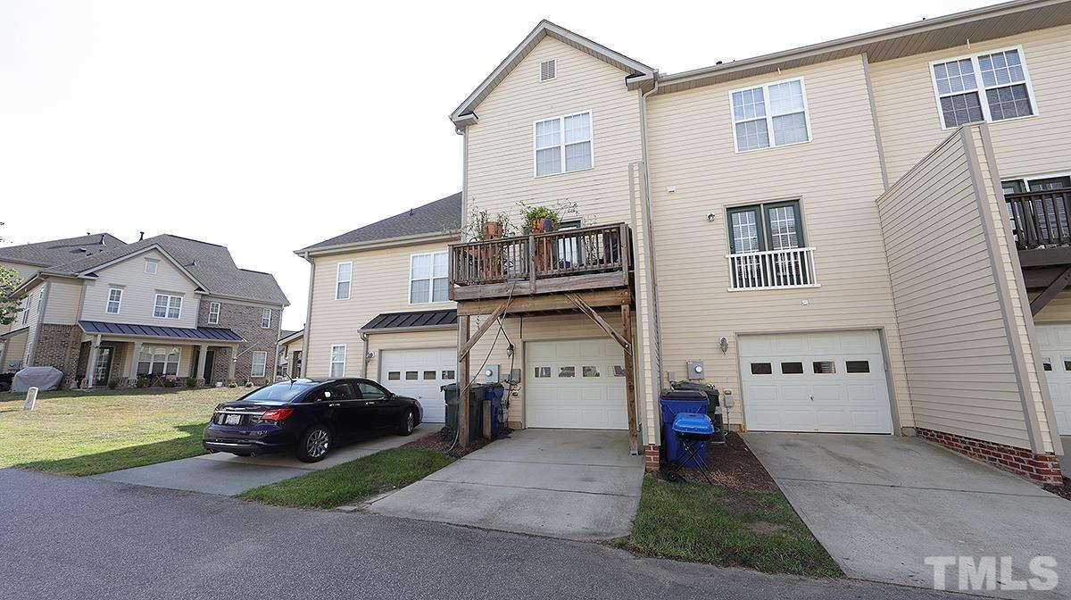 9818 Grettle Court Raleigh, NC 27617 - Photo 12 of 14 a house view with a outdoor space