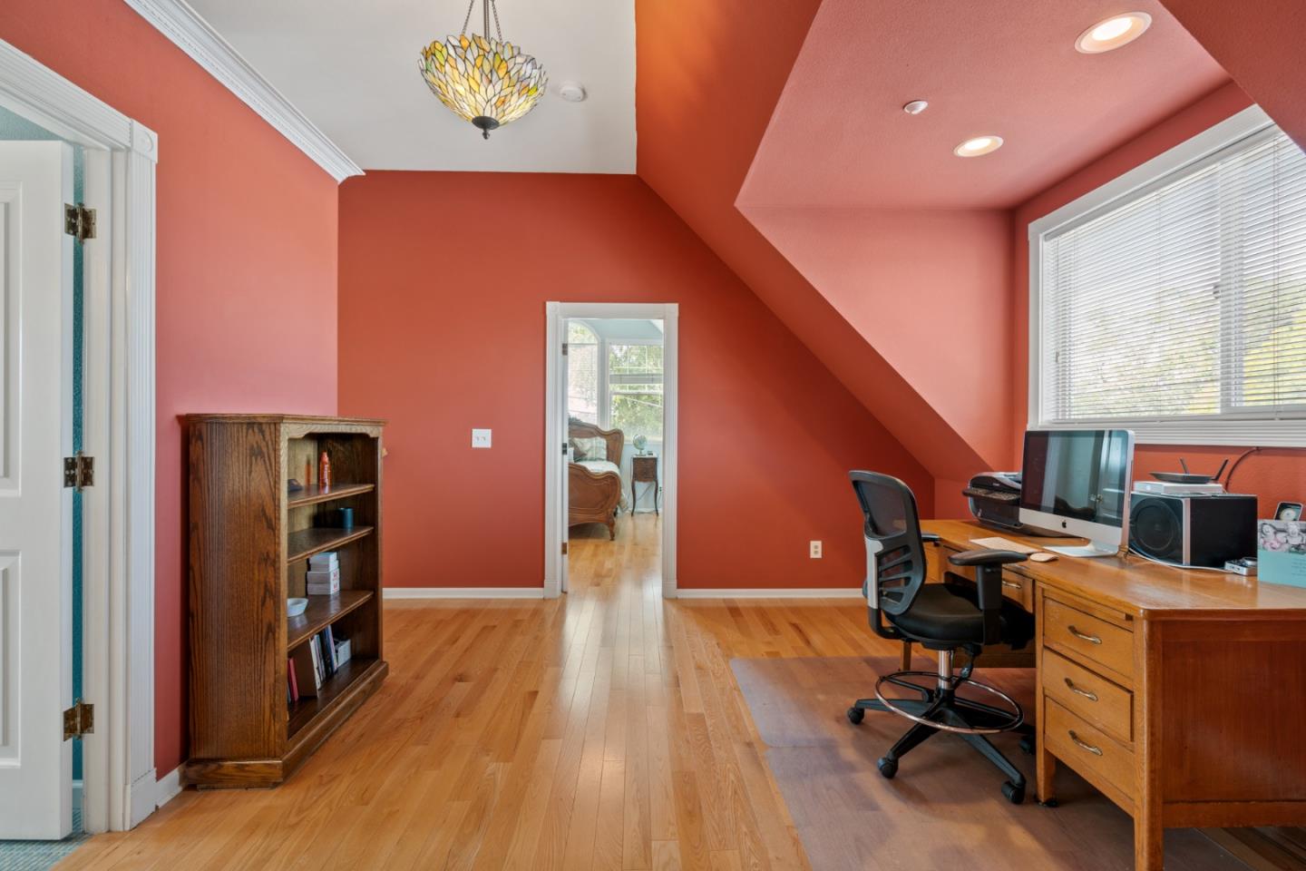 142 16th Avenue San Mateo, CA 94402 - Photo 16 of 25 a view of a workspace with furniture and a window