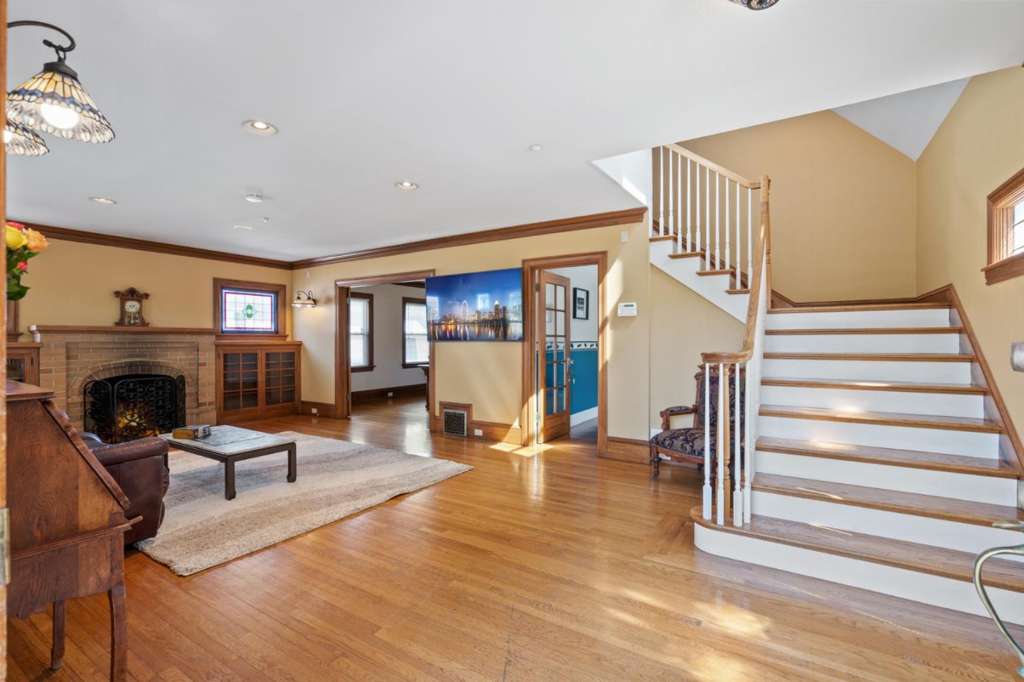 142 16th Avenue San Mateo, CA 94402 - Photo 2 of 25 a view of a livingroom with furniture and a fireplace