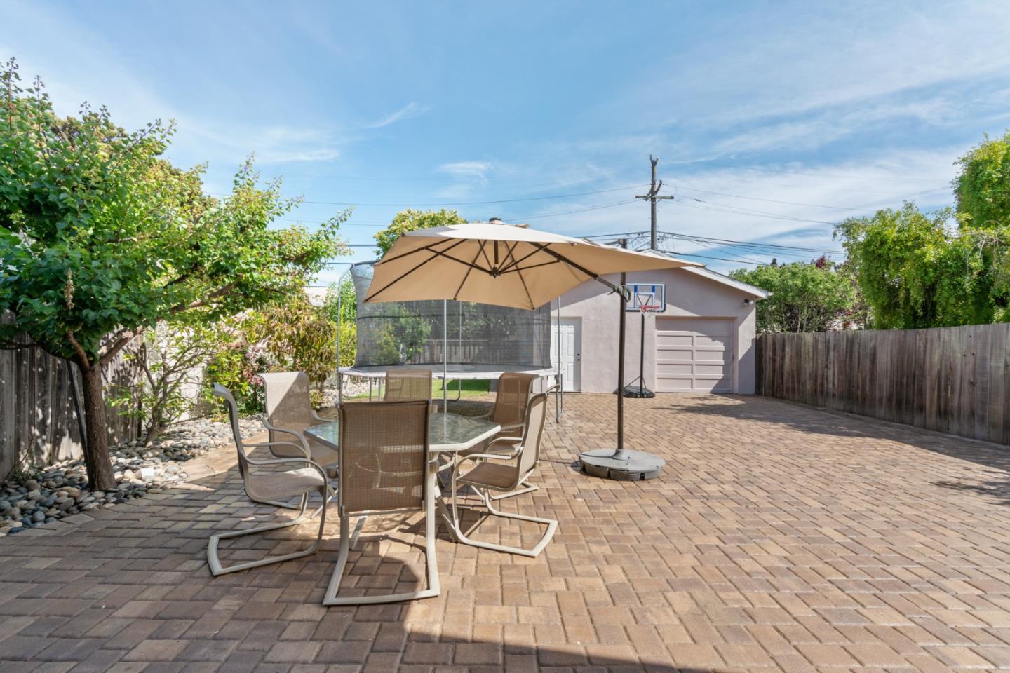 142 16th Avenue San Mateo, CA 94402 - Photo 24 of 25 a table and chairs in the patio