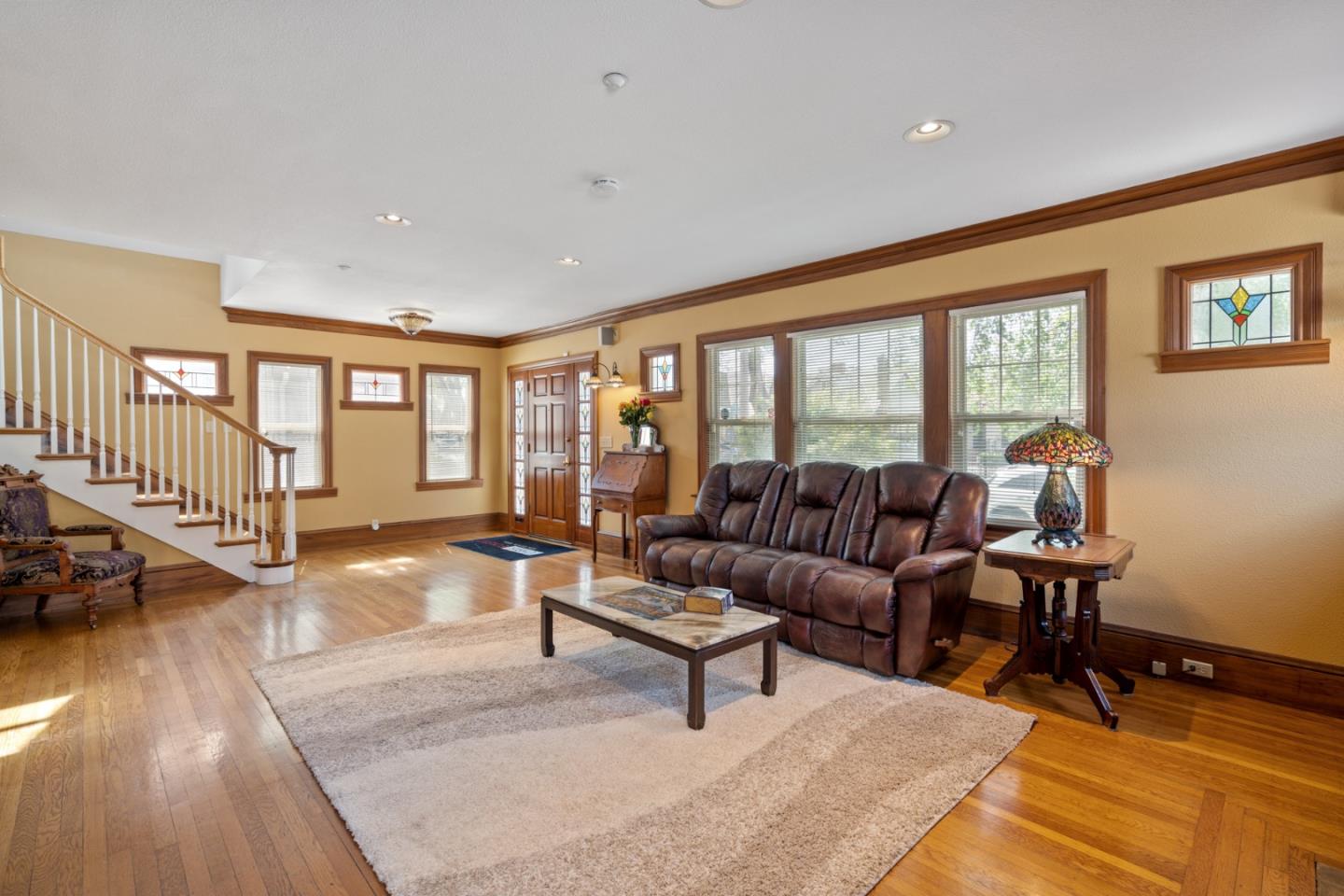 142 16th Avenue San Mateo, CA 94402 - Photo 3 of 25 a living room with furniture and a wooden floor