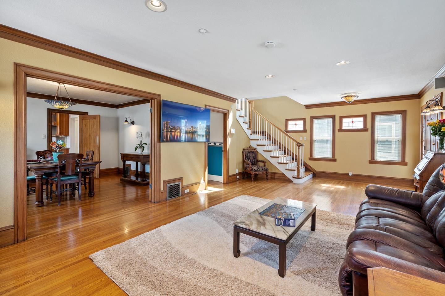 142 16th Avenue San Mateo, CA 94402 - Photo 4 of 25 a living room with furniture and a wooden floor