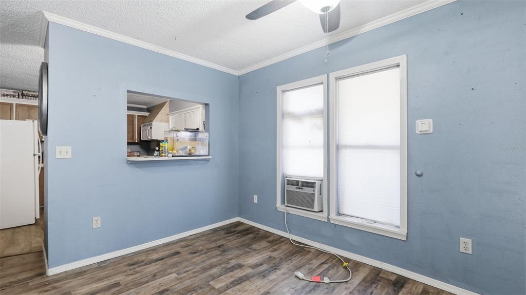 10565 Bessemer Street New Port Richey, FL 34654 - Photo 60 of 72 an empty room with windows