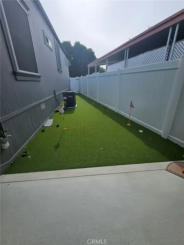 a view of a back yard of the house