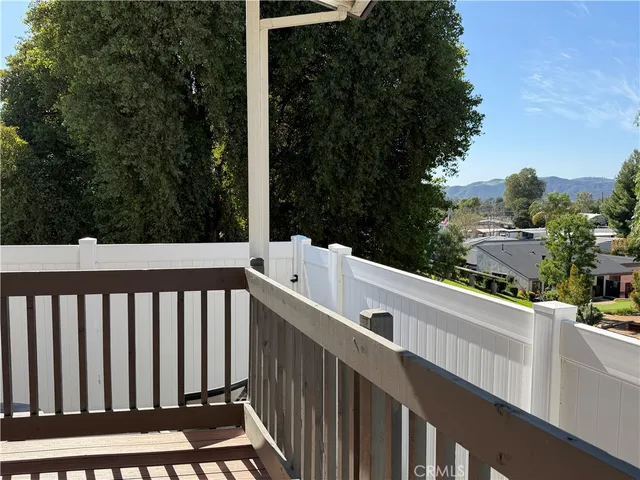 a view of a wooden fence