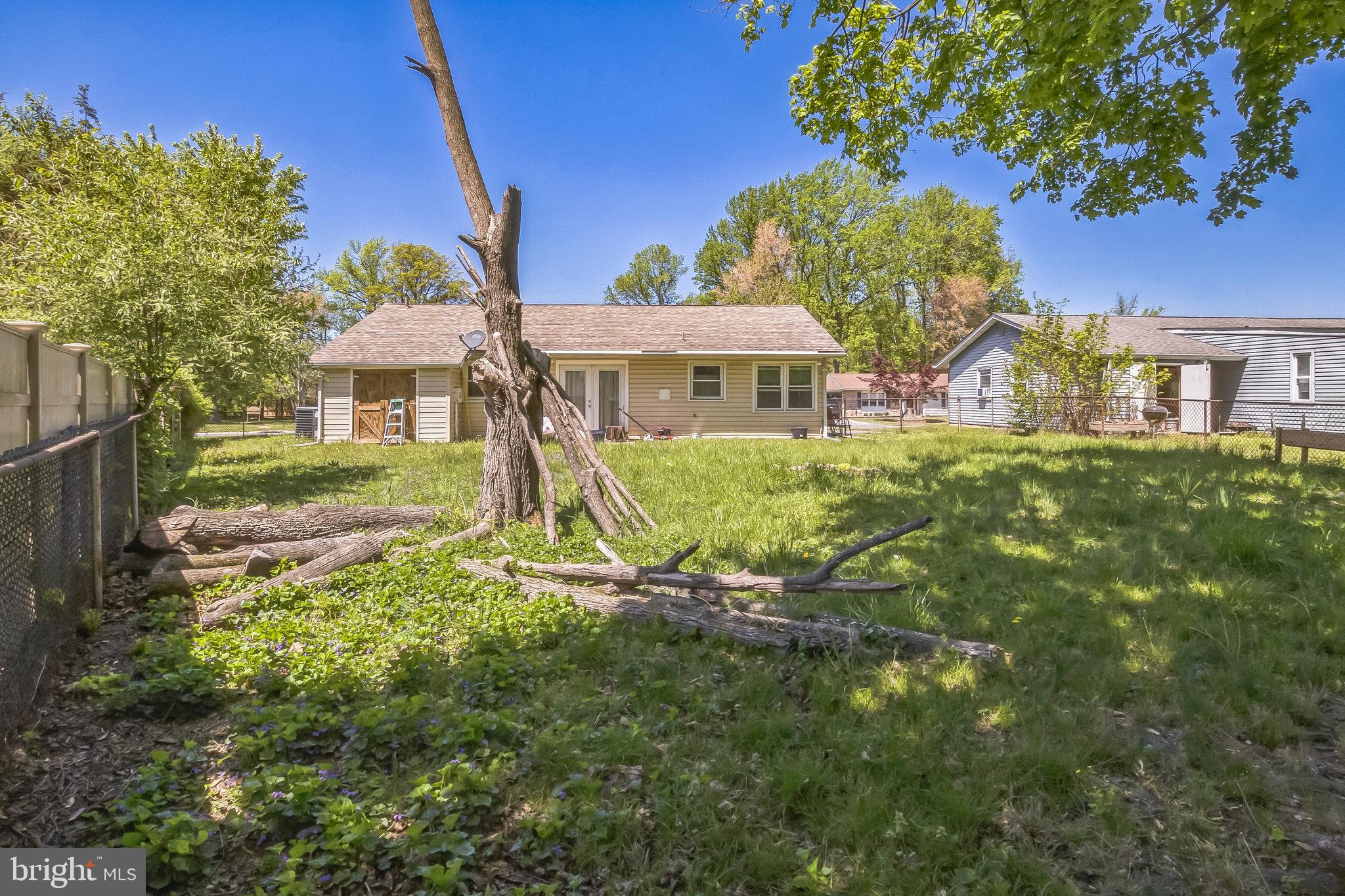 9 Queens Way Newark, DE 19713 - Photo 25 of 28 a view of a house with a big yard and large tree
