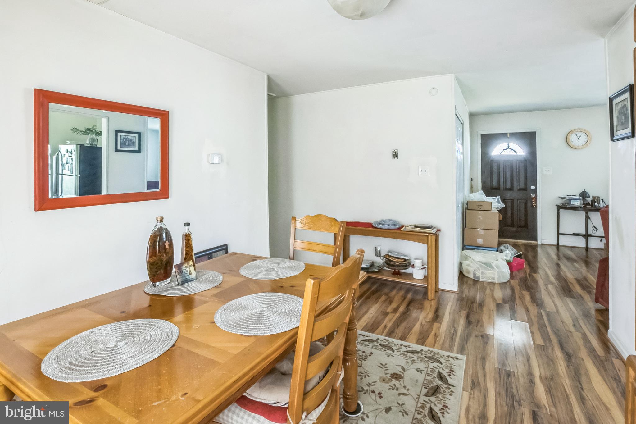 9 Queens Way Newark, DE 19713 - Photo 9 of 28 a dining room with furniture and wooden floor