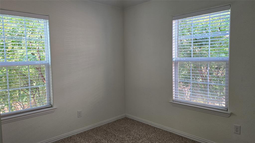 706 South Jupiter Road, Unit 1507 Allen, TX 75002 - Photo 20 of 31 a view of an empty room with a window