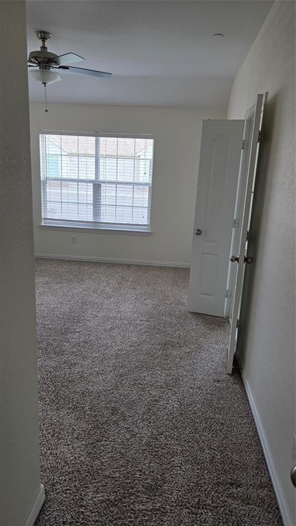 706 South Jupiter Road, Unit 1507 Allen, TX 75002 - Photo 22 of 31 an empty room with windows