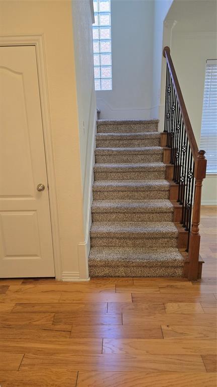 706 South Jupiter Road, Unit 1507 Allen, TX 75002 - Photo 4 of 31 a view of entryway with wooden floor