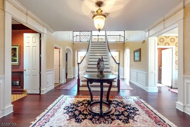 a view of entryway with wooden floor