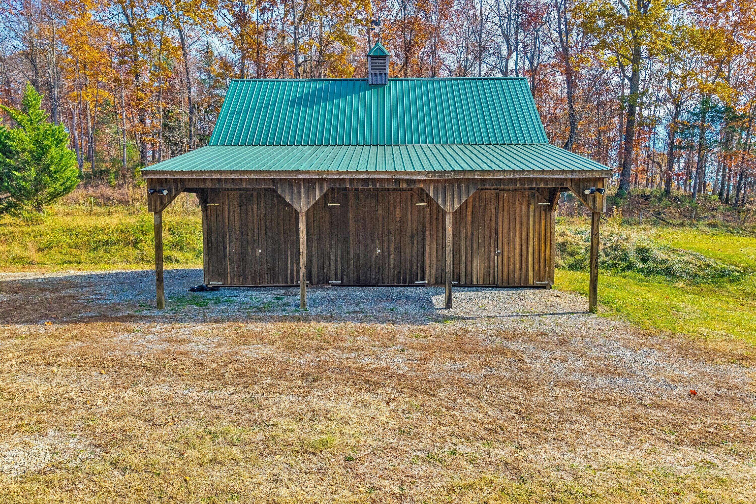 0 Grove Hill Road Fincastle, VA 24090 - Photo 26 of 76 a front view of a house with a yard and garage