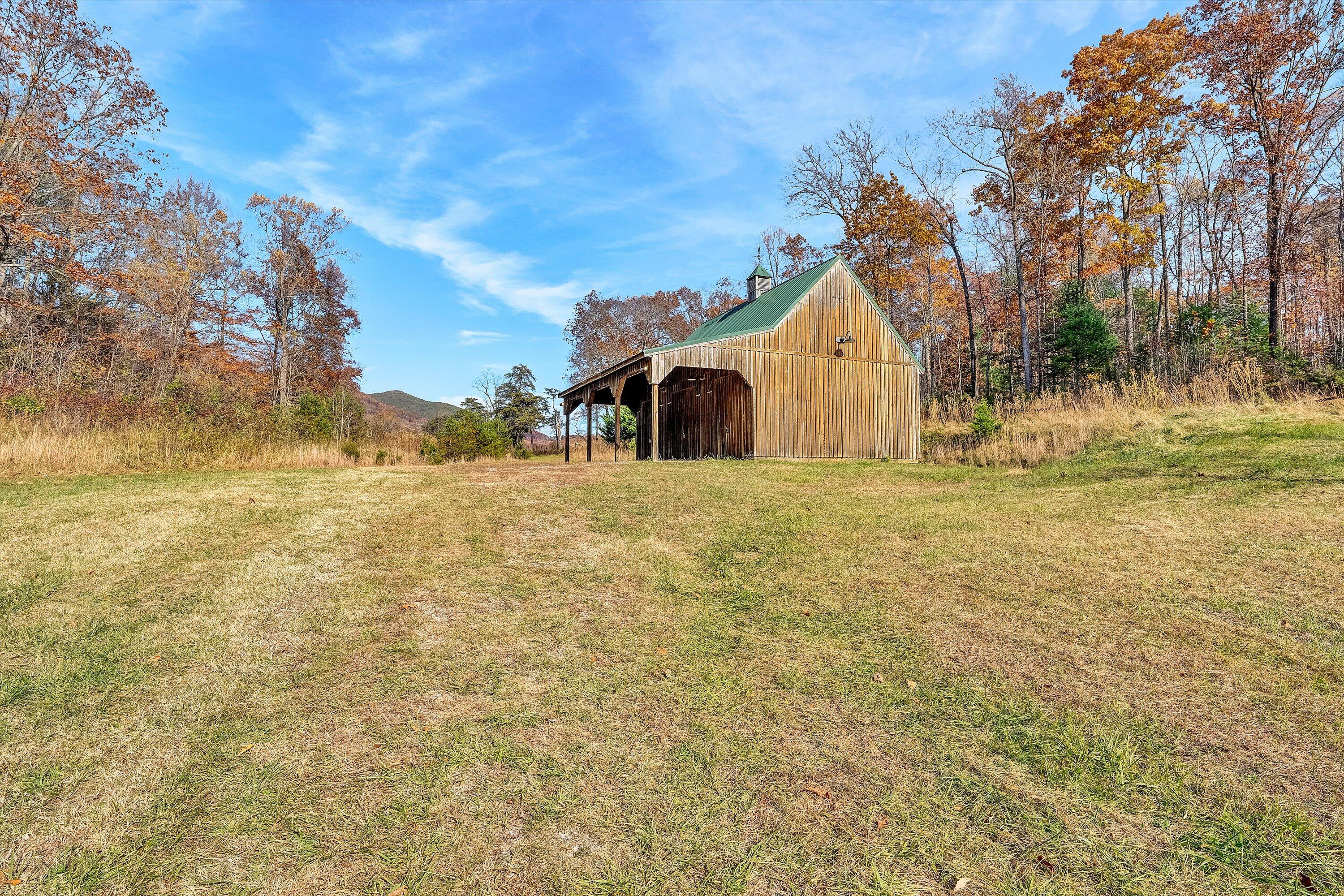 0 Grove Hill Road Fincastle, VA 24090 - Photo 71 of 76 a large house with a big yard and large trees