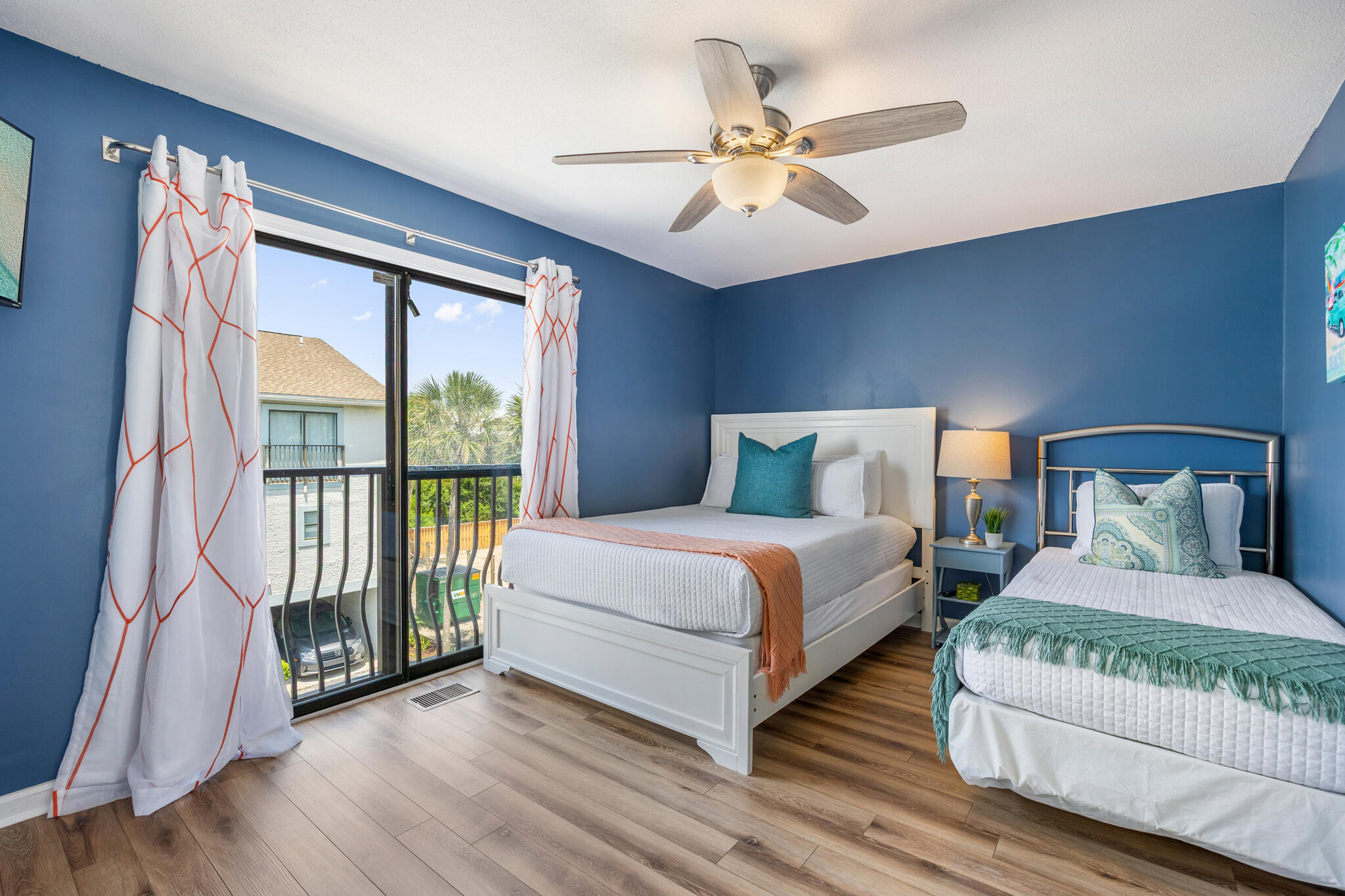 11 Driftwood Road, Unit 2 Miramar Beach, FL 32550 - Photo 30 of 45 a bedroom with double bed and a large window