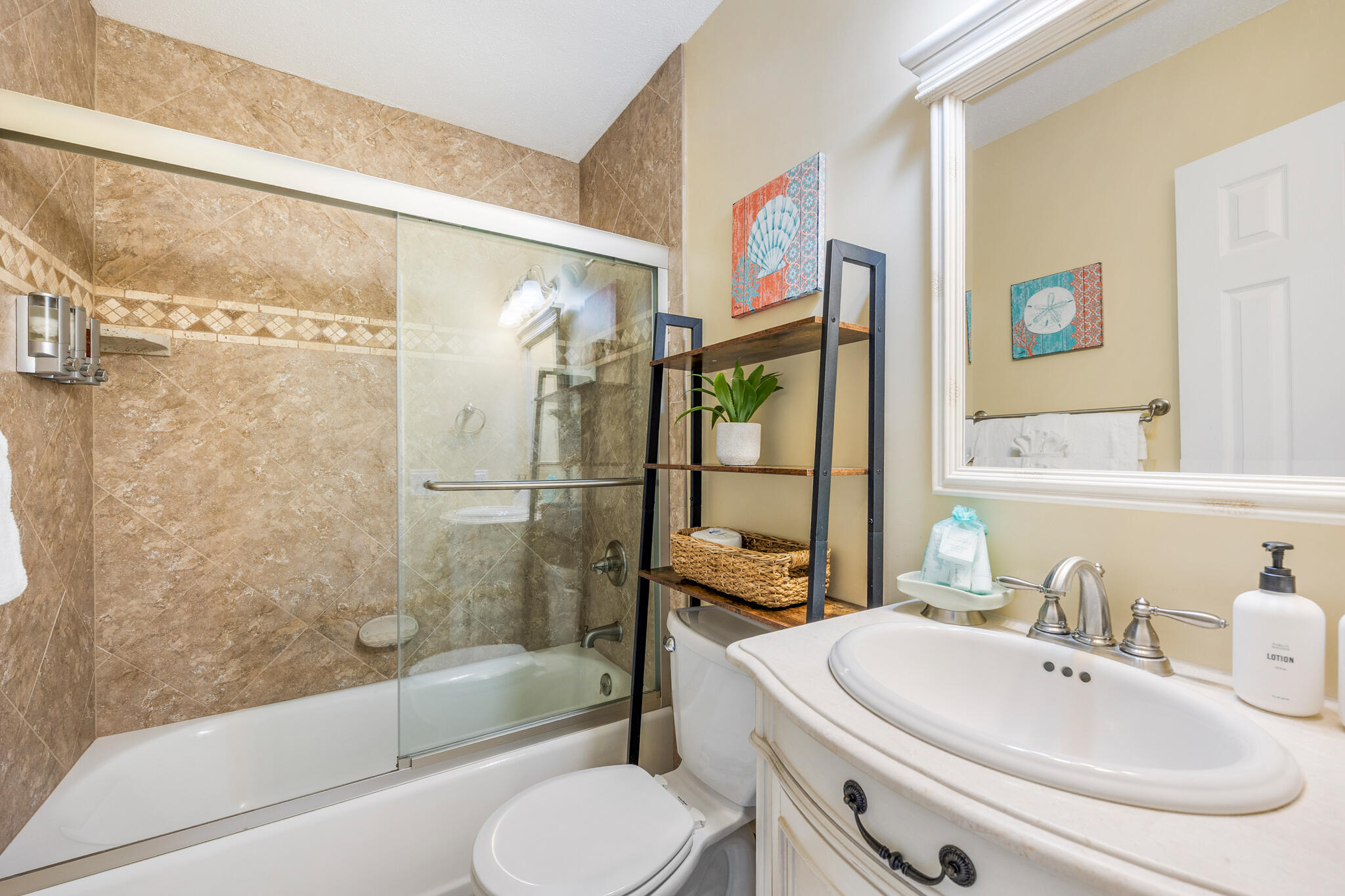 11 Driftwood Road, Unit 2 Miramar Beach, FL 32550 - Photo 31 of 45 a bathroom with a sink toilet and shower