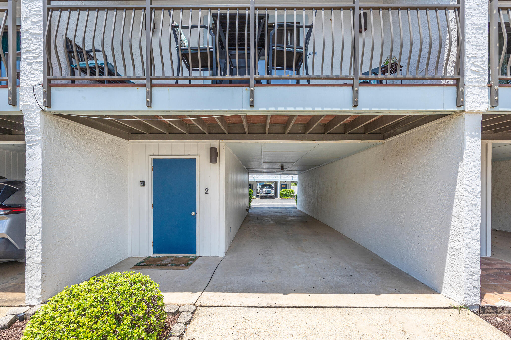 11 Driftwood Road, Unit 2 Miramar Beach, FL 32550 - Photo 33 of 45 a view of a patio with table and chairs
