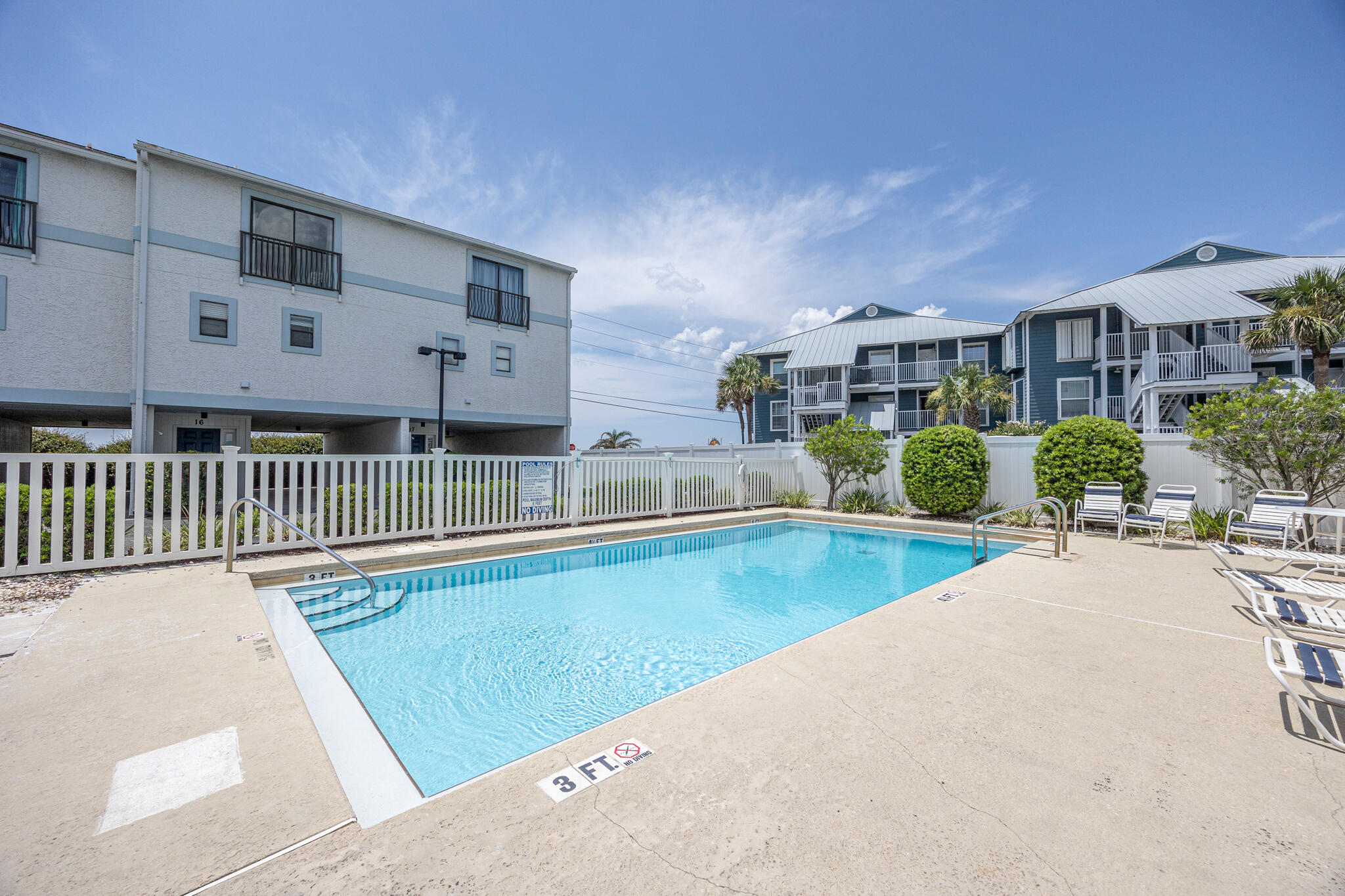 11 Driftwood Road, Unit 2 Miramar Beach, FL 32550 - Photo 35 of 45 a view of a house with a swimming pool