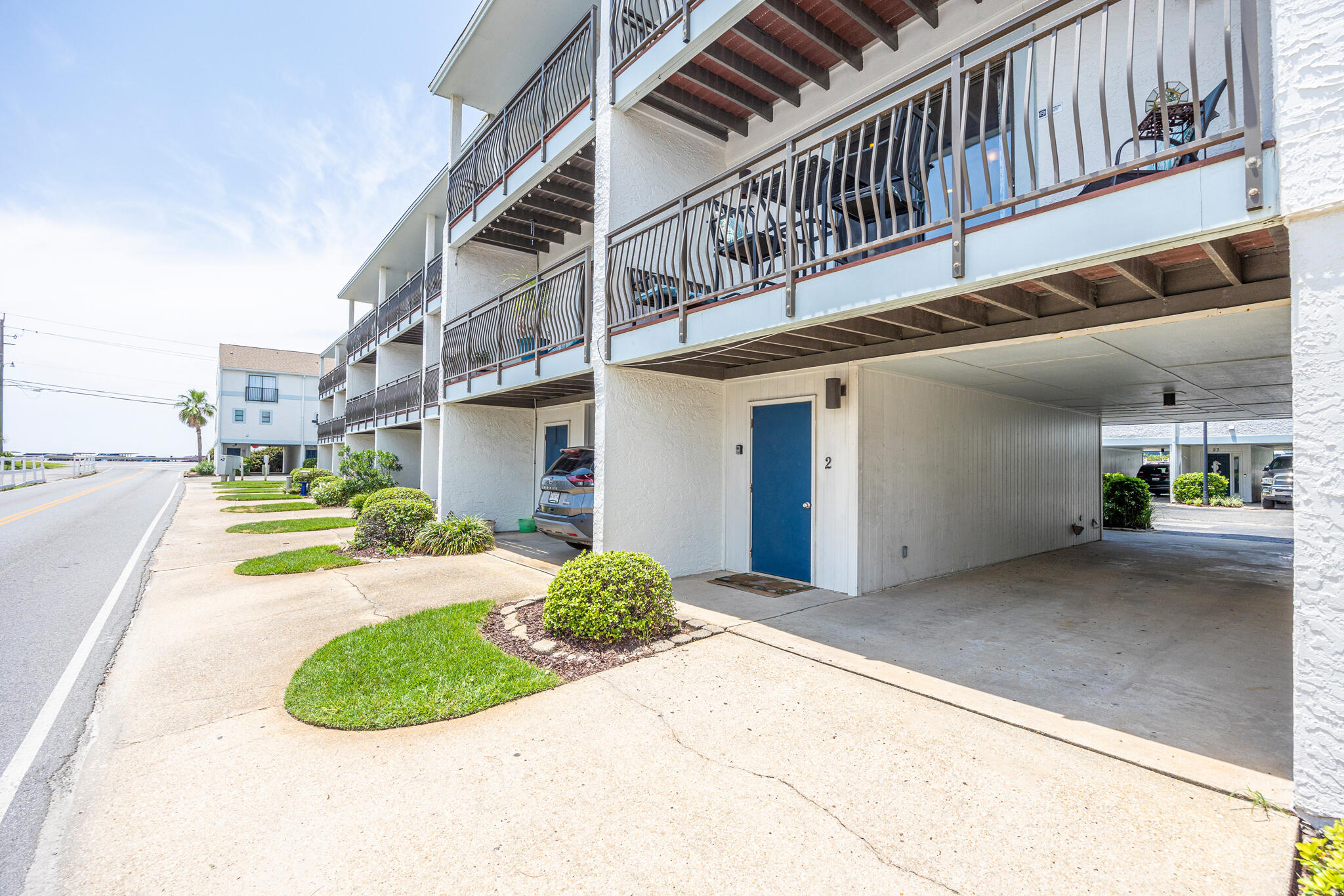 11 Driftwood Road, Unit 2 Miramar Beach, FL 32550 - Photo 5 of 45 a view of a house with a swimming pool