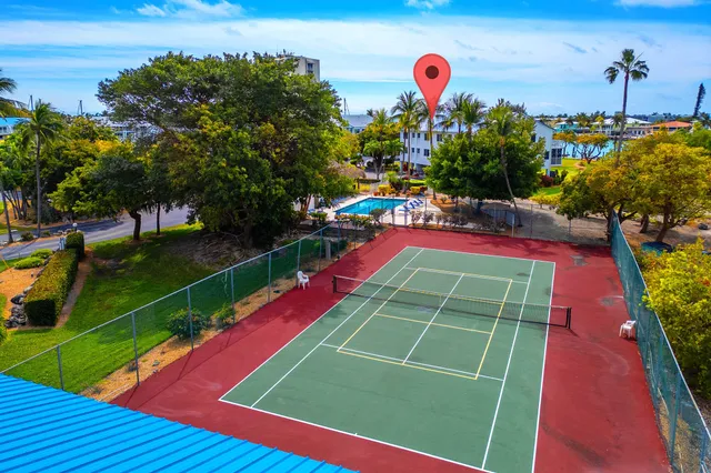 a workspace with furniture and window
