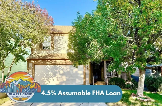 a view of outdoor space with a garden and signage