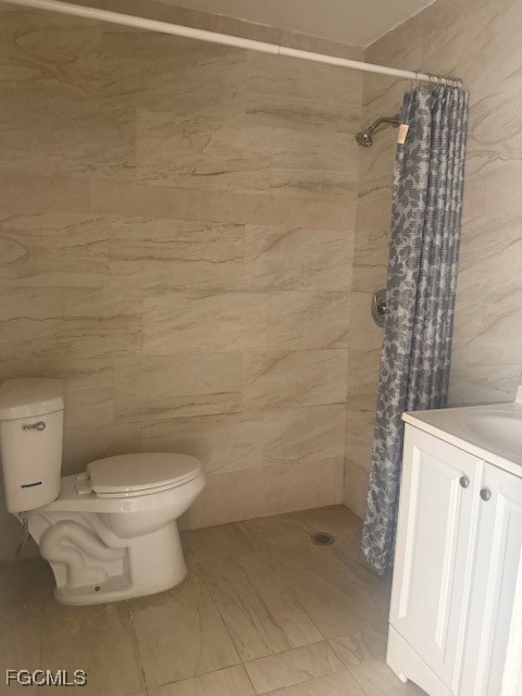 3207 Broadway Fort Myers, FL 33901 - Photo 13 of 25 a bathroom with a toilet and a shower