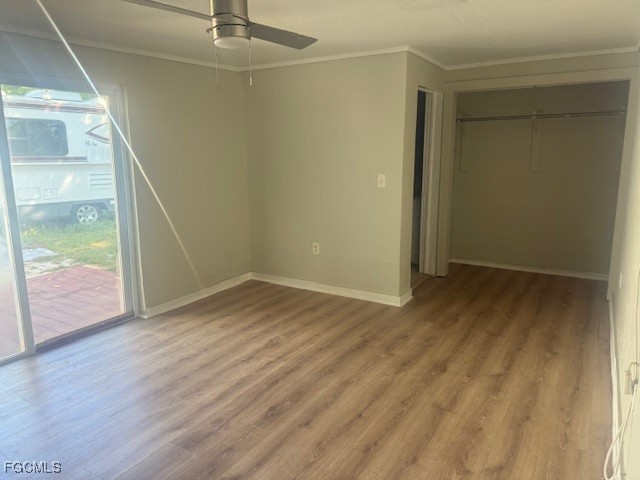 3207 Broadway Fort Myers, FL 33901 - Photo 17 of 25 a view of empty room with wooden floor and fan