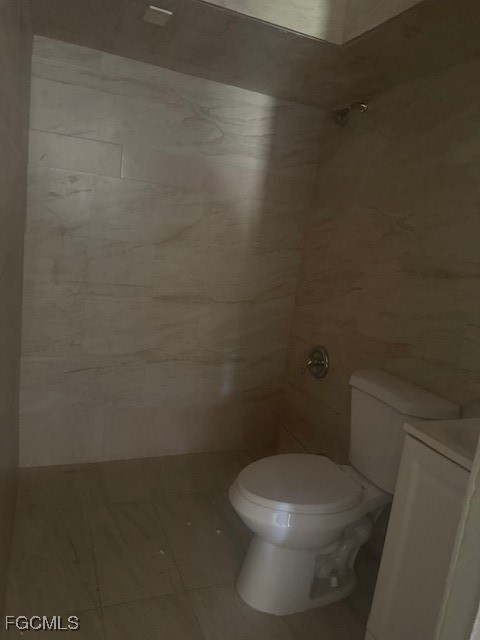 3207 Broadway Fort Myers, FL 33901 - Photo 19 of 25 a white toilet sitting next to a shower