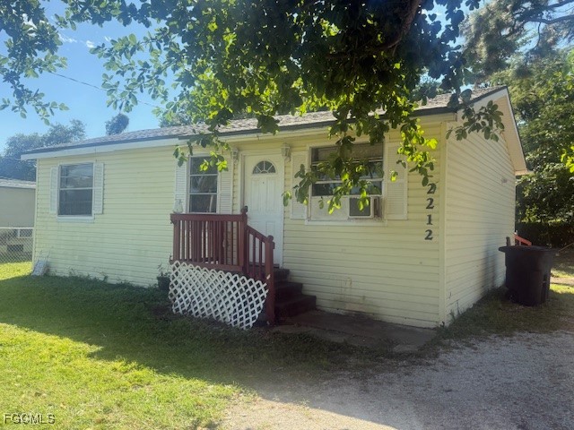 3207 Broadway Fort Myers, FL 33901 - Photo 20 of 25 front view of a house with a yard