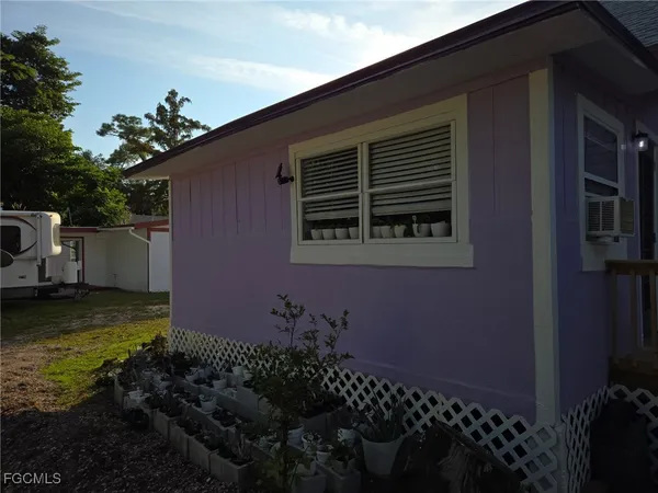 a view of a backyard of the house