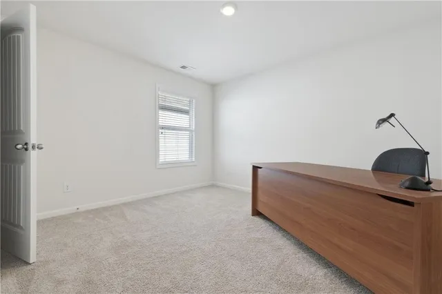 a room with a bed and a window