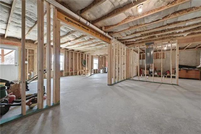 a view of a hallway with seating area