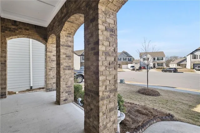 a view of a city from a corridor