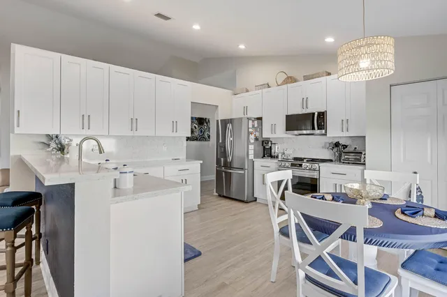 a view of a dining room with furniture