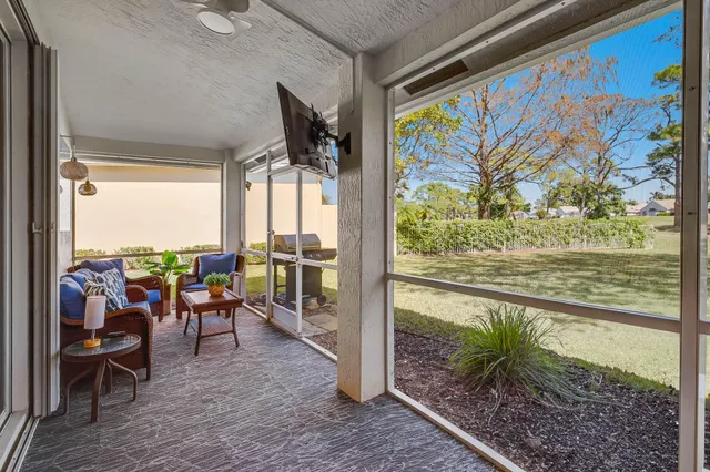 view of living room with furniture and wall paintings