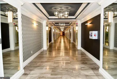 a view of swimming pool with furniture