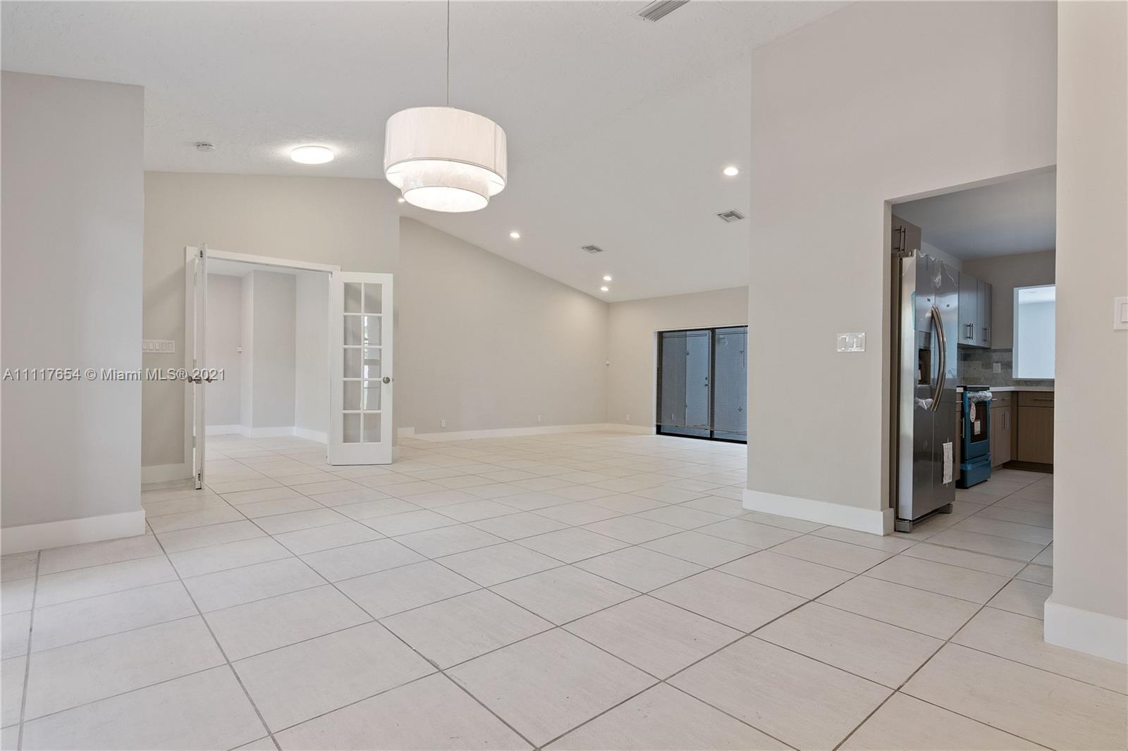 1960 Southwest 51st Terrace Plantation, FL 33317 - Photo 12 of 35 a view of a livingroom with a furniture