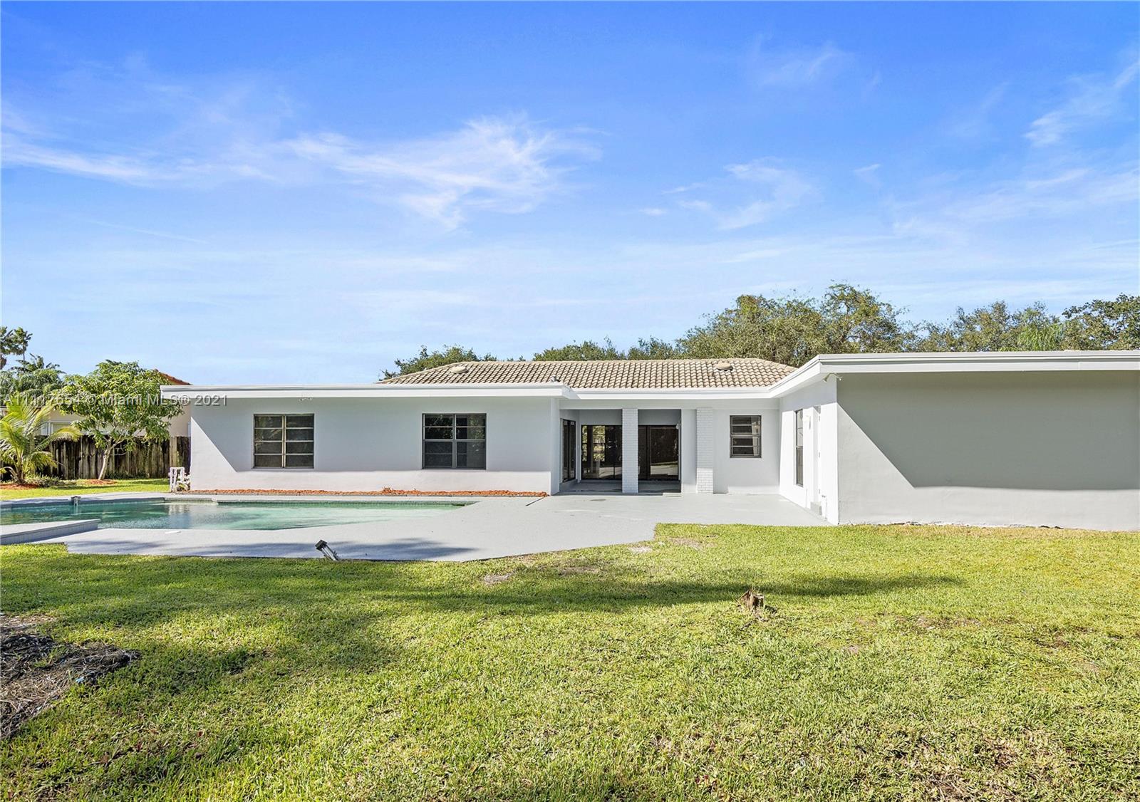 1960 Southwest 51st Terrace Plantation, FL 33317 - Photo 32 of 35 a front view of house with yard and seating space