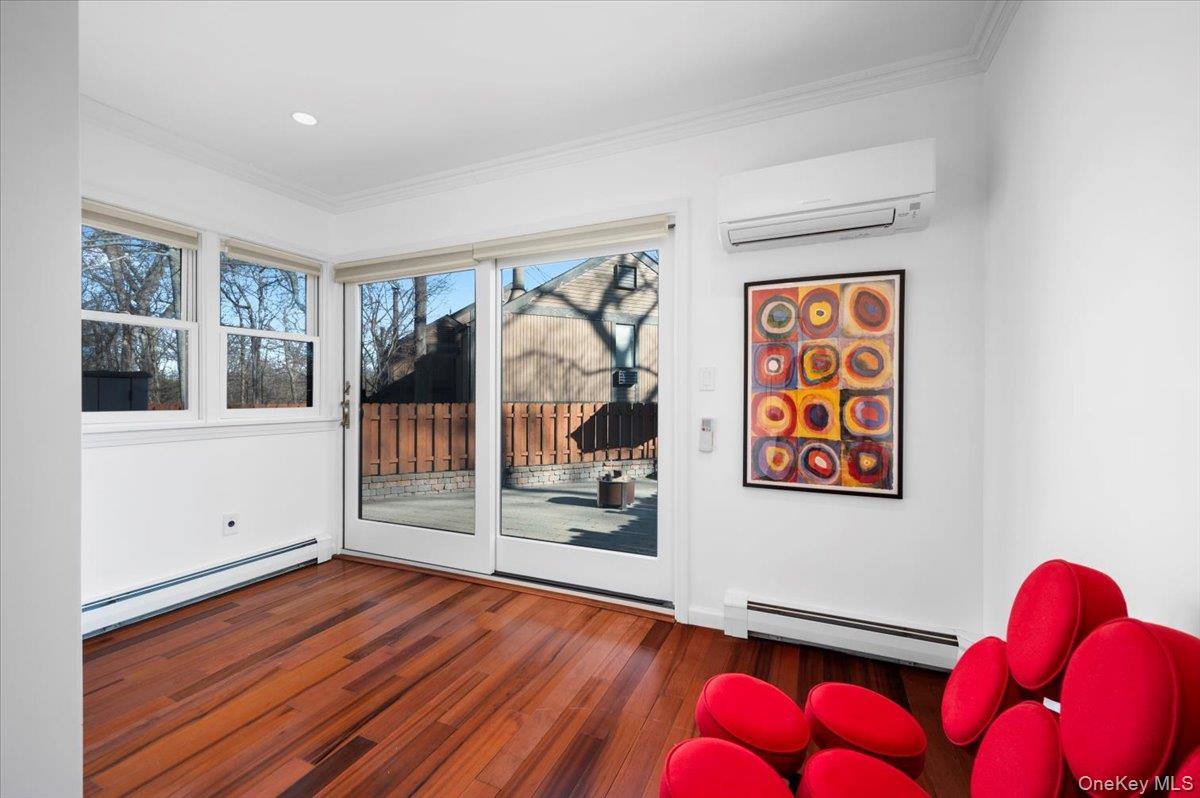 110 Round Hill Road Dobbs Ferry, NY 10522 - Photo 12 of 42 Bonus room with sliding glass doors to patio