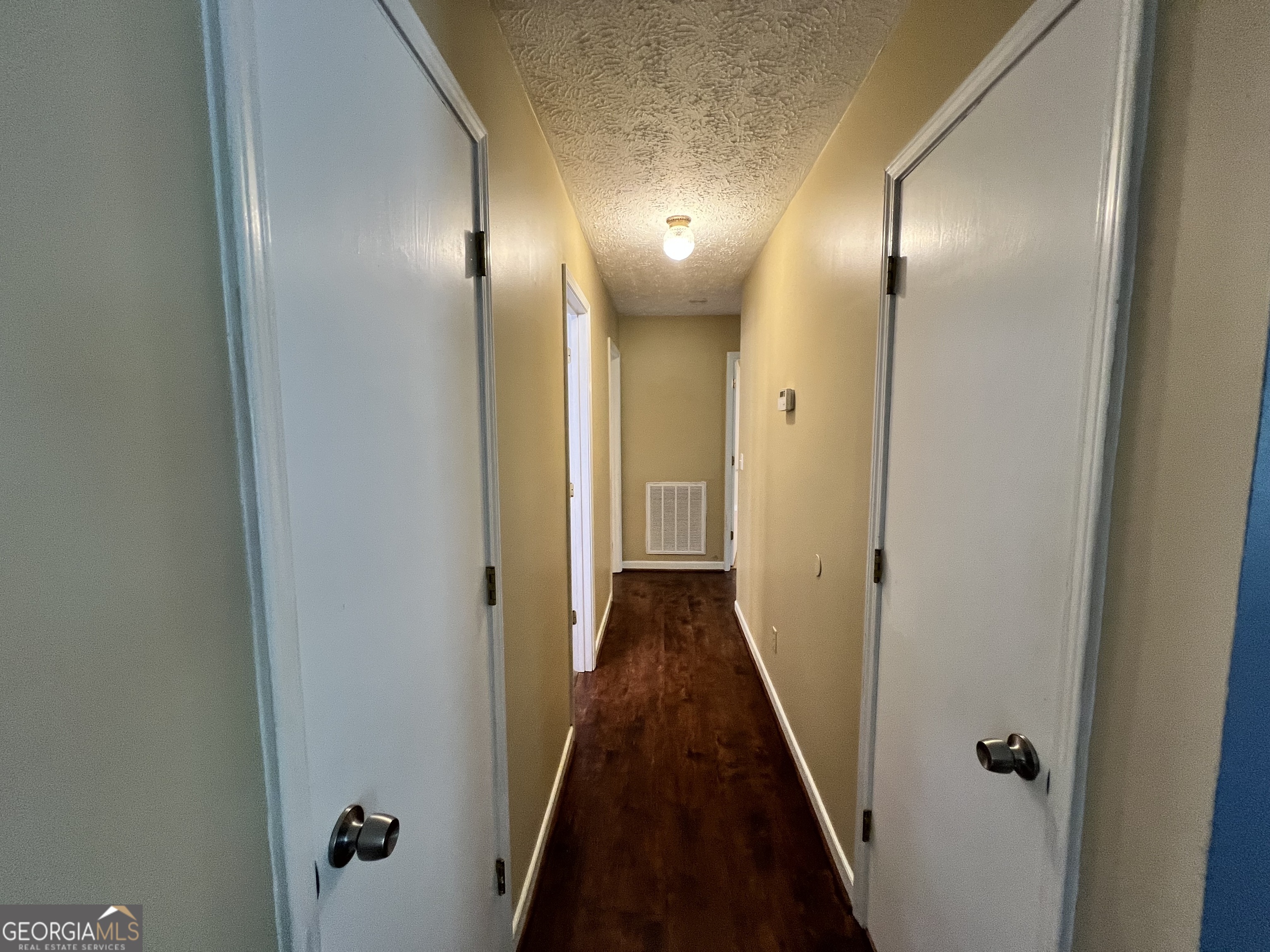 32 Ford Drive Southeast Rome, GA 30161 - Photo 13 of 49 a view of a hallway with wooden floor