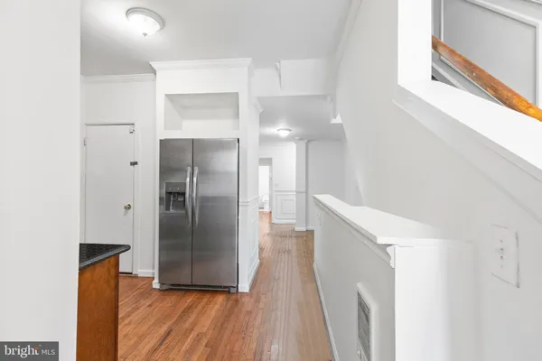 a view of a kitchen with a sink