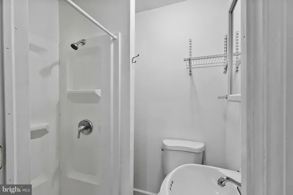 a bathroom with a sink toilet and vanity