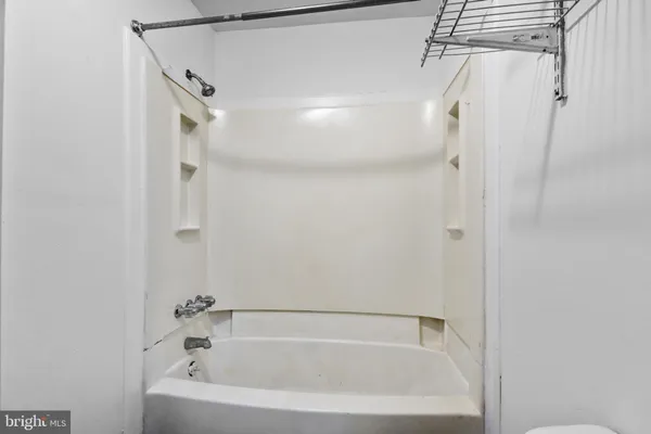 wooden view of an empty room with a window