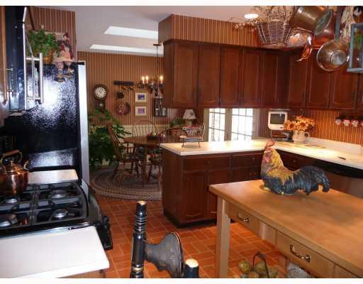 136 Saunders Road Trafford, PA 15085 - Photo 7 of 18 Kitchen. Spacious kitchen with center island and eat-in breakfast nook